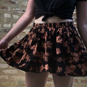 Tie-dyed black and orange mini skirt